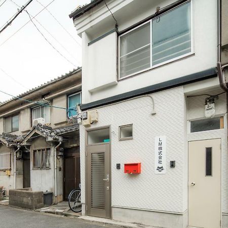 Sakuragawa No Shima Apartment Osaka Bagian luar foto