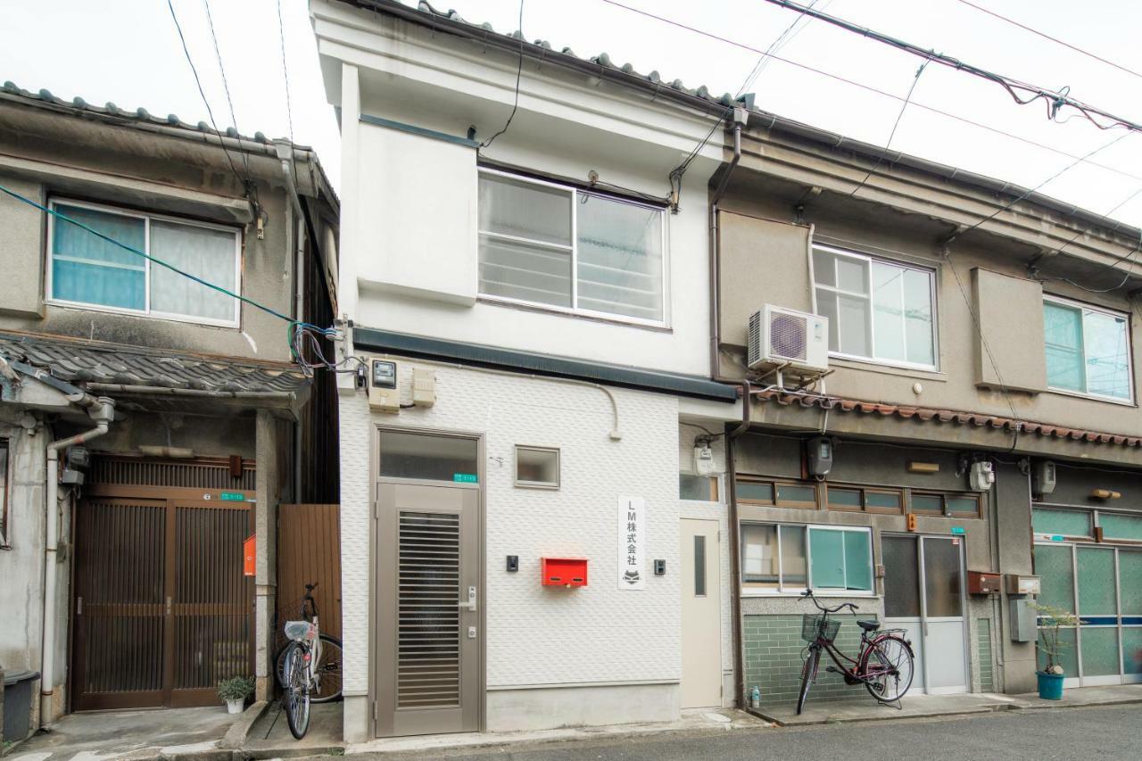 Sakuragawa No Shima Apartment Osaka Bagian luar foto