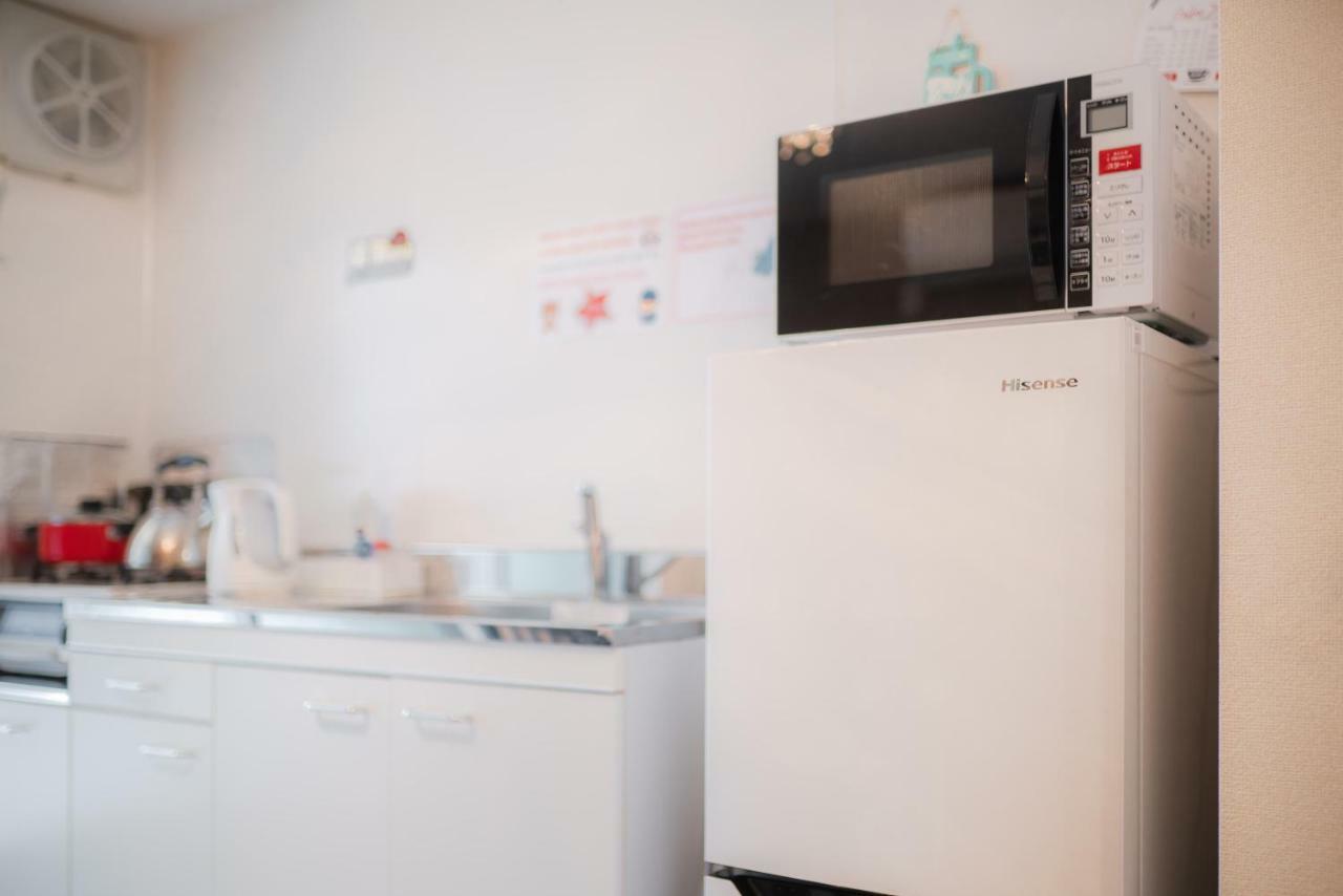 Sakuragawa No Shima Apartment Osaka Bagian luar foto