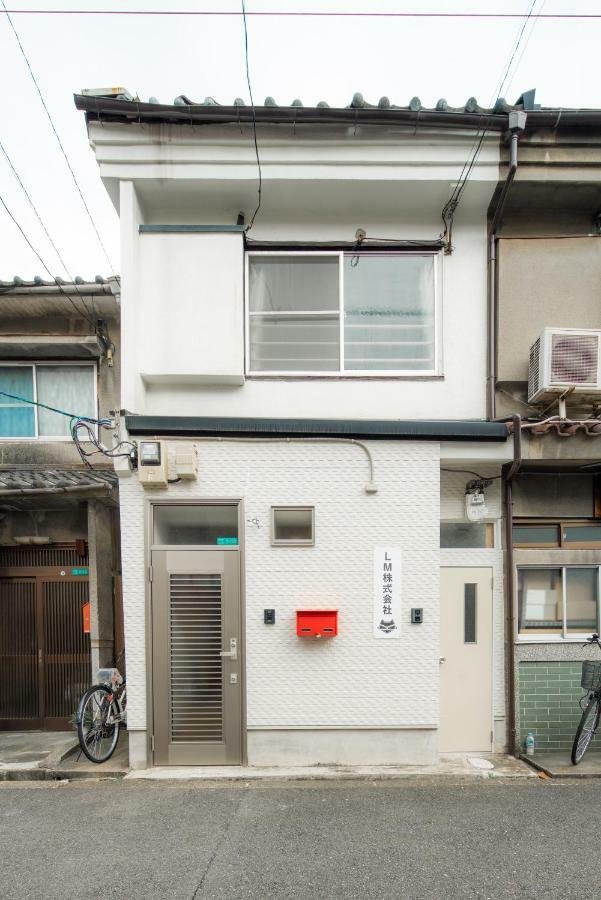 Sakuragawa No Shima Apartment Osaka Bagian luar foto
